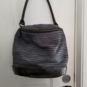 Ma Jo italian leather hand bag. Very unusual style